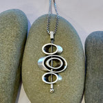 Sterling Silver Spinner Necklaces