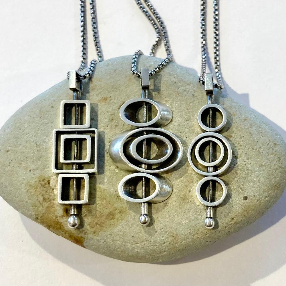 Sterling Silver Spinner Necklaces