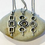 Sterling Silver Spinner Necklaces